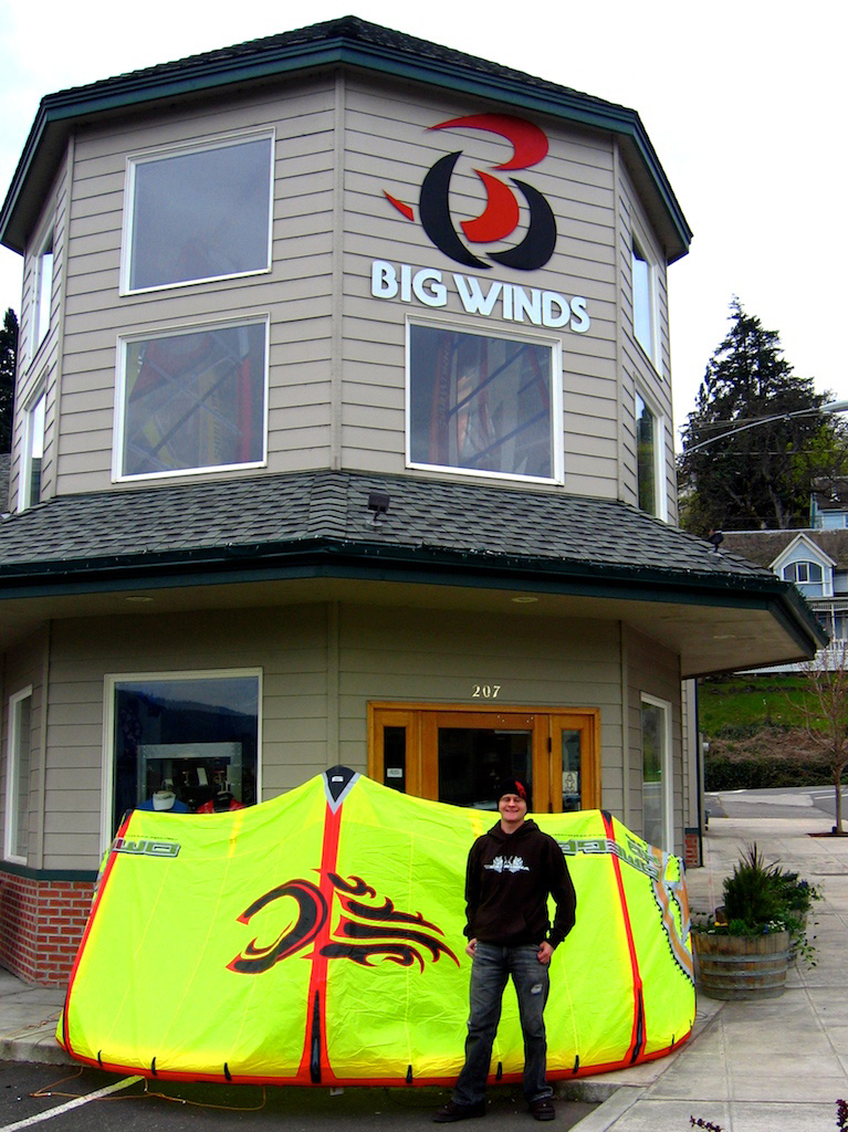 Dane with his kite of choice in front of Big Winds.